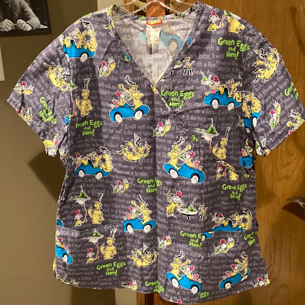 Dr. Seuss Nursing Scrub Top, size large. Two front pockets